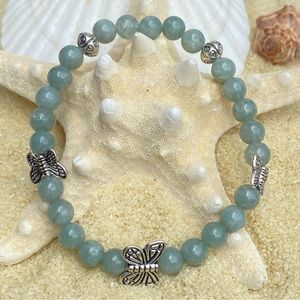 Beaded bracelet - Jade and silver tone with butterflies